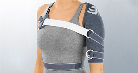 Orthopedic stabilizing shoulder harness brace